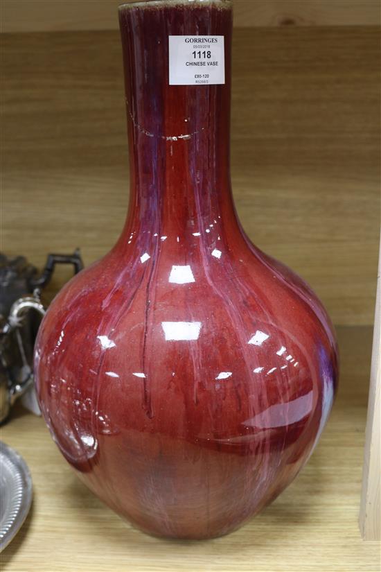 A Chinese sang de boeuf vase height 41cm (a.f.)